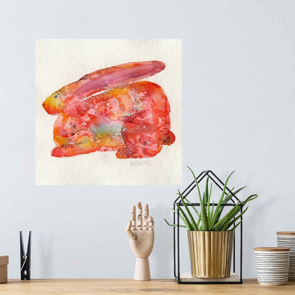 A bohemian room featuring A watercolor rabbit in shades of red and orange.
