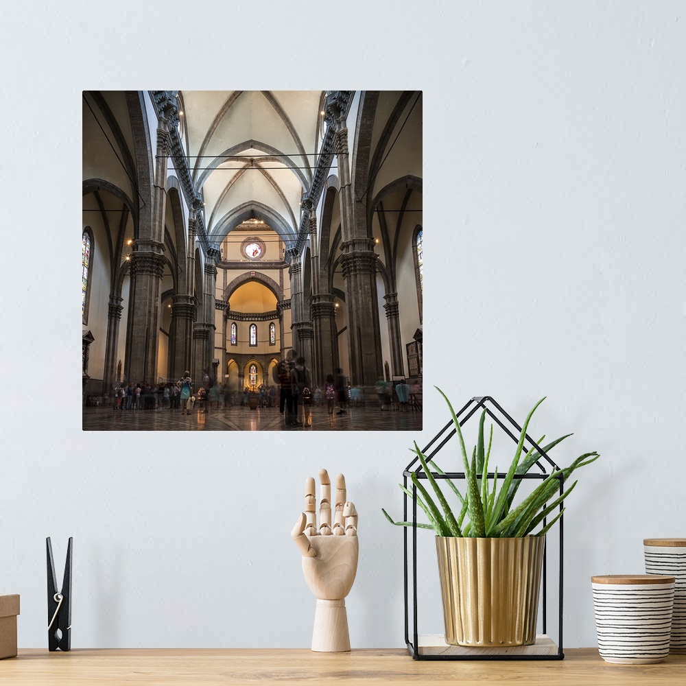 A bohemian room featuring people in a cathedral, color photograph