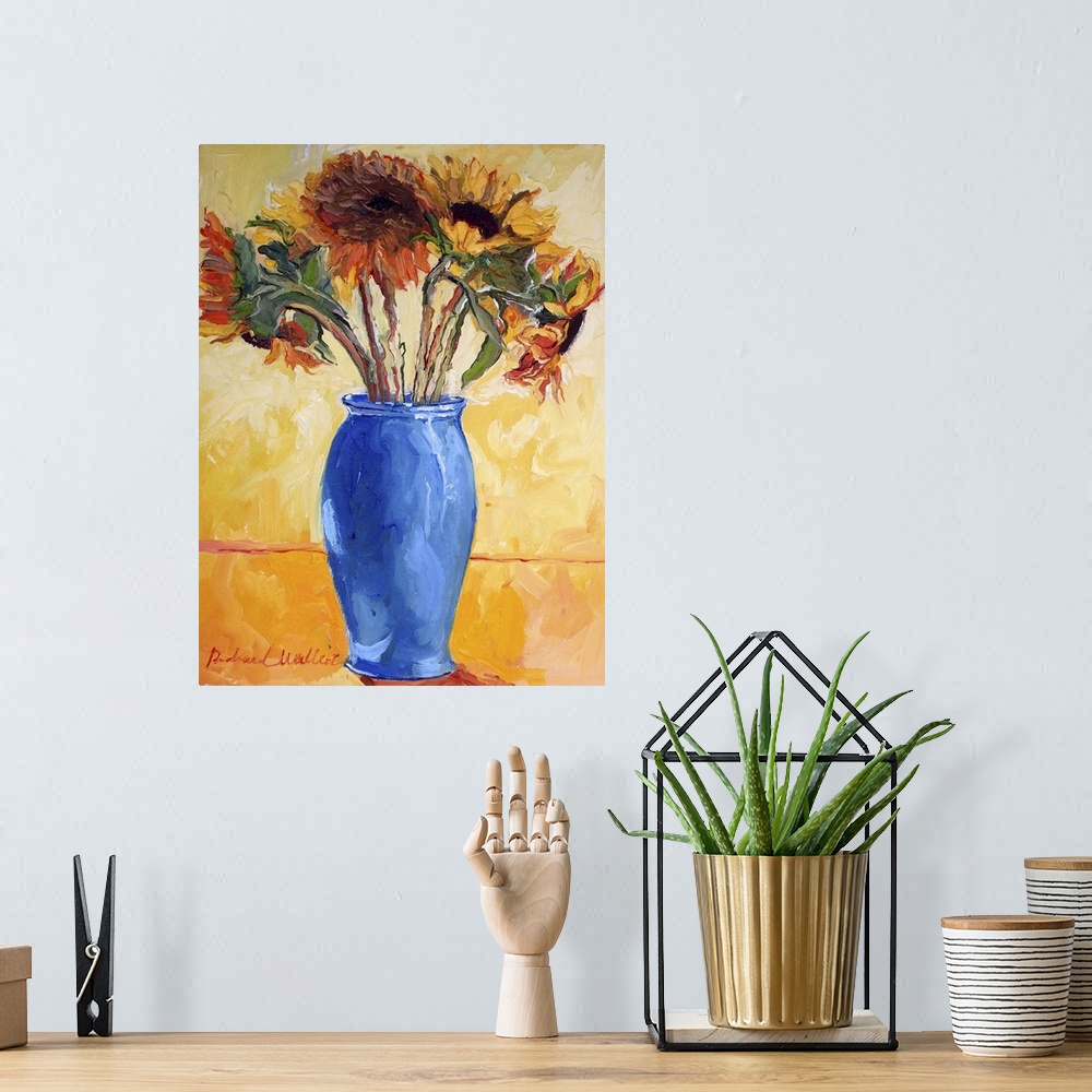 A bohemian room featuring Contemporary colorful painting of sunflowers in a blue vase.