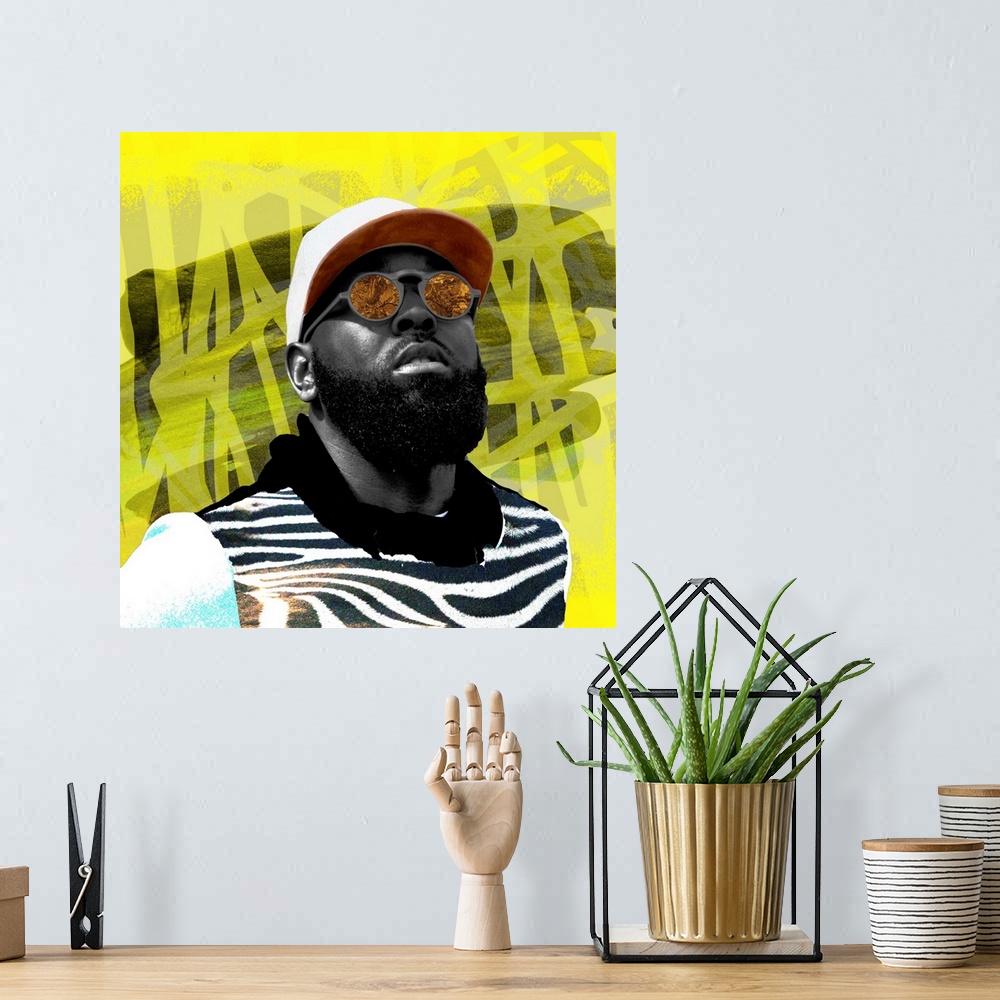 A bohemian room featuring A contemporary grafitti collage style painting of a Black man wearing reflective sunglasses. A ve...