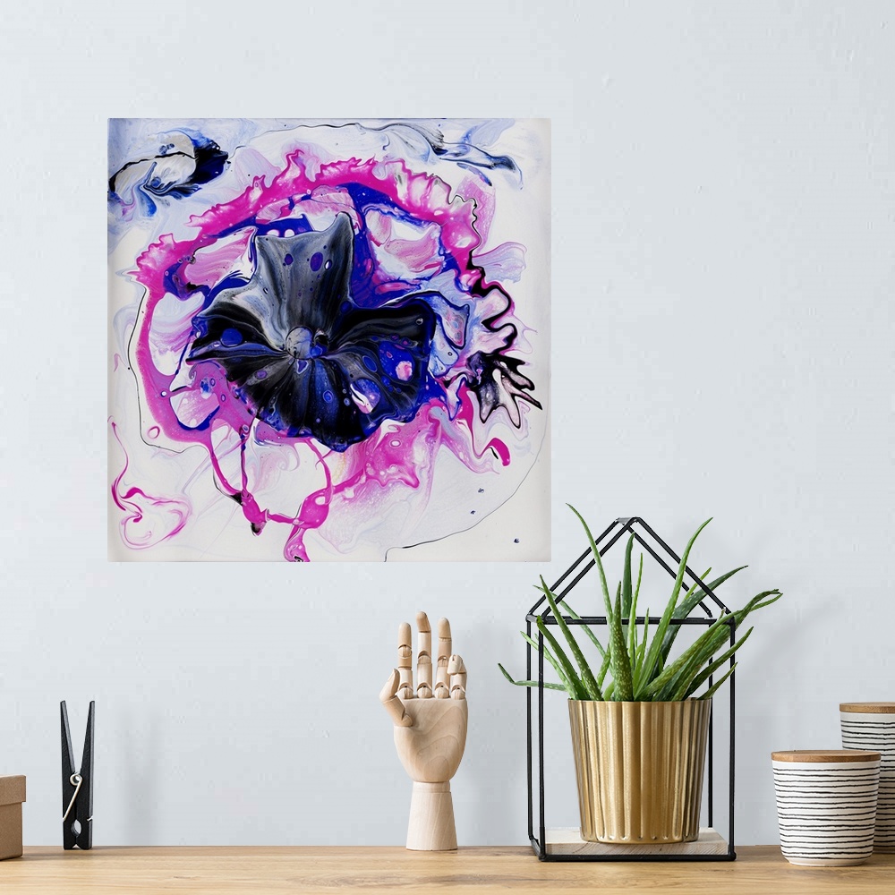 A bohemian room featuring Pour painting of a flower in vibrant pink and blue colors on a white, ample background for added ...