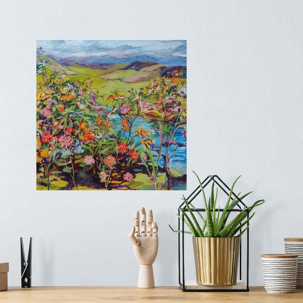 A bohemian room featuring Contemporary impressionist painting with colorful flowers and fruit in a landscape.