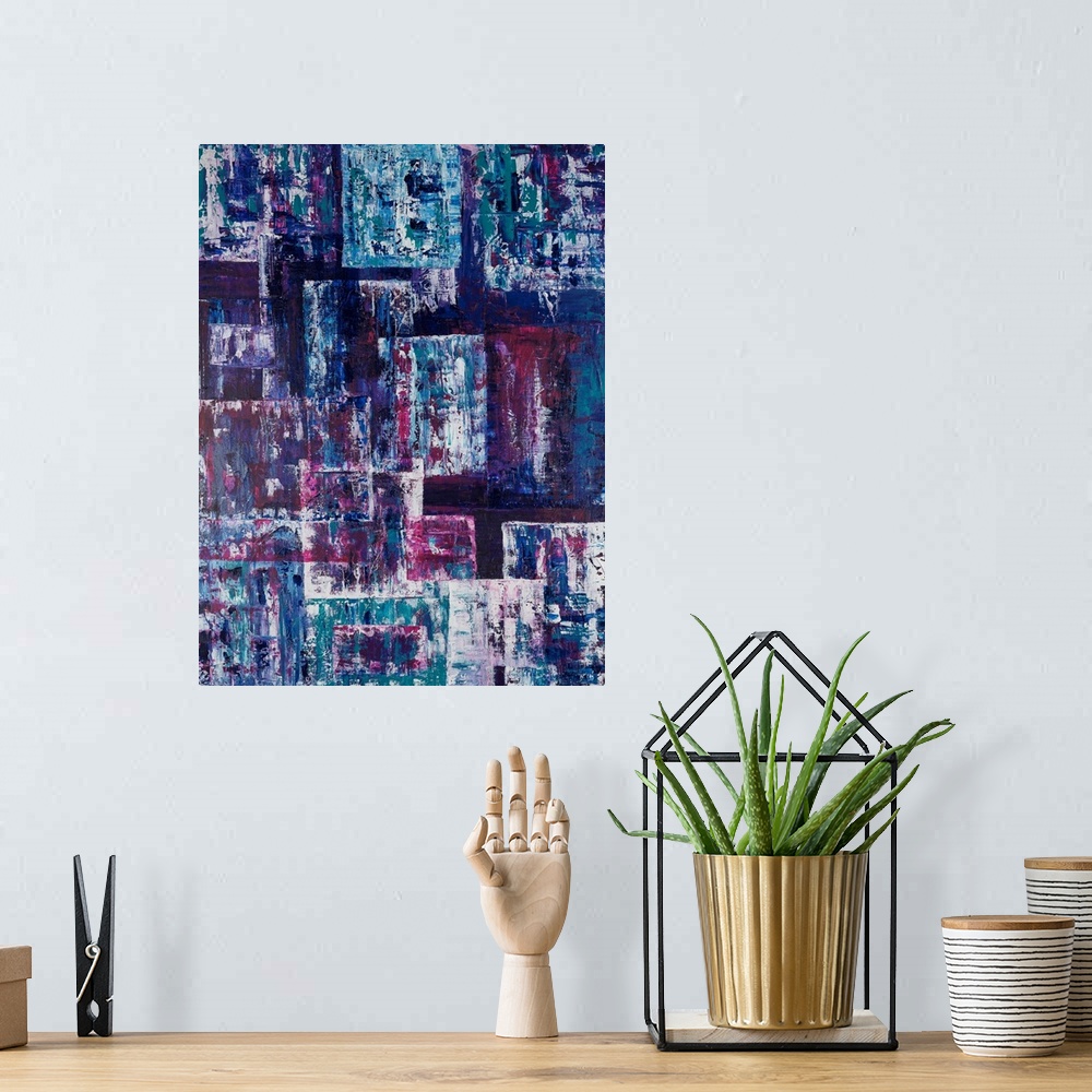 A bohemian room featuring Painting on paper of geometric shapes harmonizing in tonal blues.