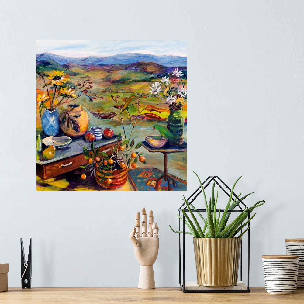 A bohemian room featuring Colorful landscape and still life with flowers, fruit, and birds.