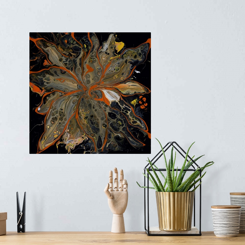 A bohemian room featuring Pour painting of a flower outlined with bright orange that complements its neutral-colored petals...