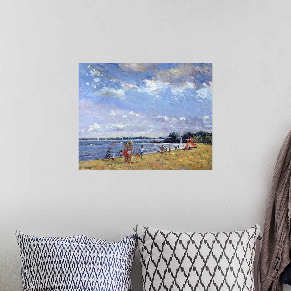 A bohemian room featuring Contemporary painting of people playing on the beach in the summer.