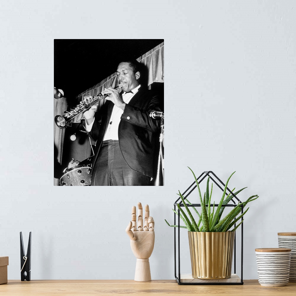 A bohemian room featuring American jazz saxophone player John Coltrane (1926-1967) here playing the soprano saxophone, 60\'...