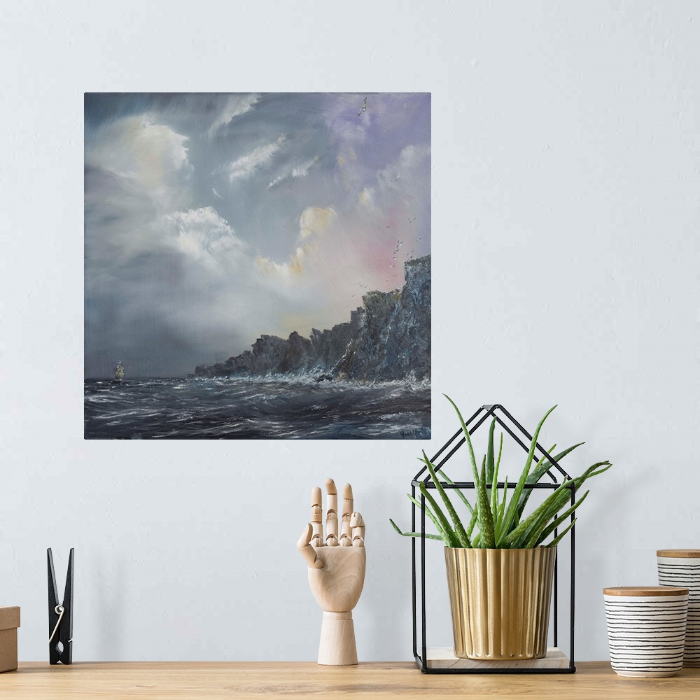 A bohemian room featuring Contemporary painting of a ship out to sea near cliffs of a coast.