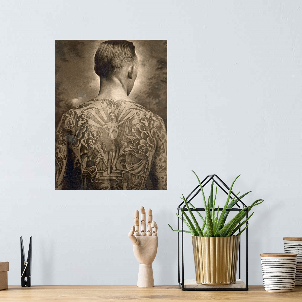 A bohemian room featuring Portrait of a tattooed man