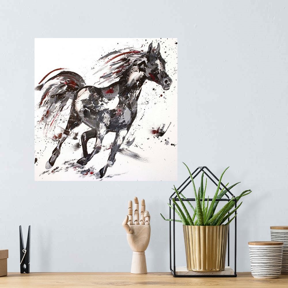 A bohemian room featuring Contemporary painting using black and gray tones to create a horse running against a white backgr...