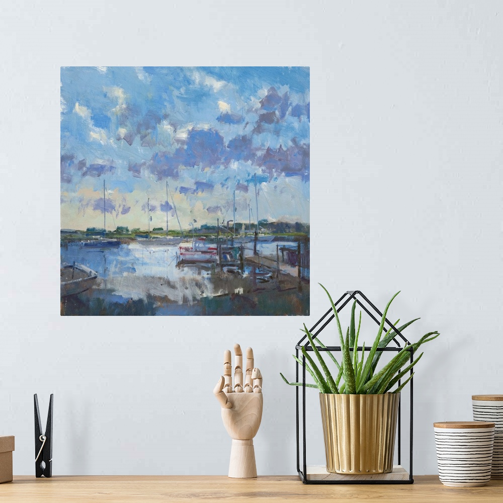 A bohemian room featuring Contemporary painting of boats in a harbor at dusk.
