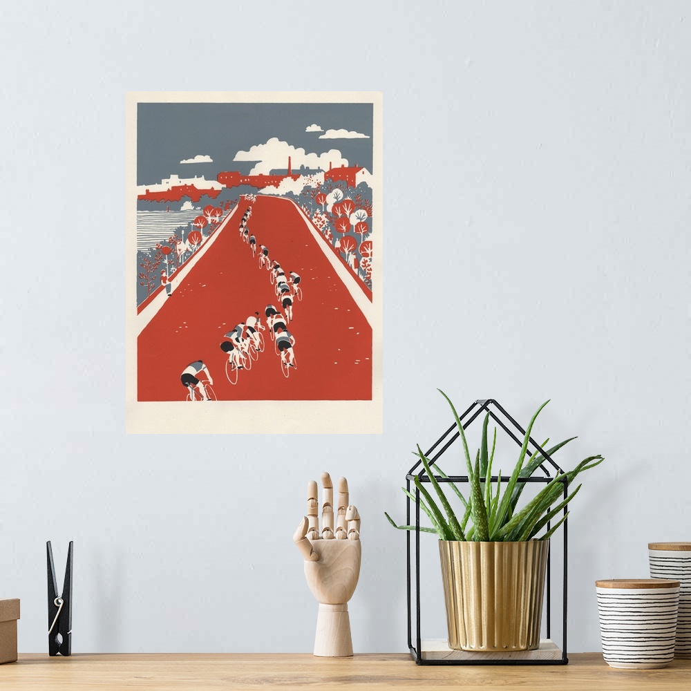 A bohemian room featuring Contemporary artwork of a cyclists on a red road.