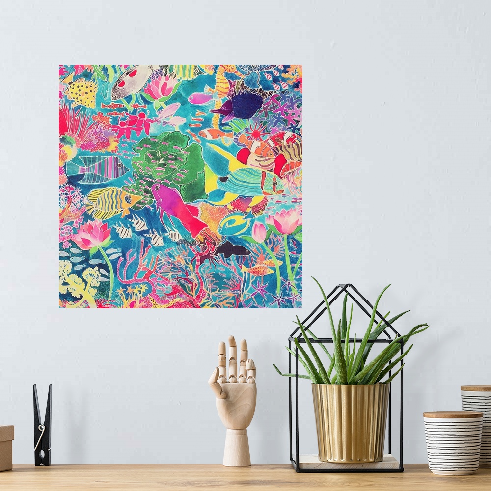 A bohemian room featuring Contemporary painting of several tropical fish in a coral reef.