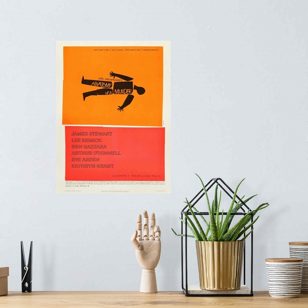 A bohemian room featuring Movie poster for Anatomy Of A Murder with bright orange and coral colors.