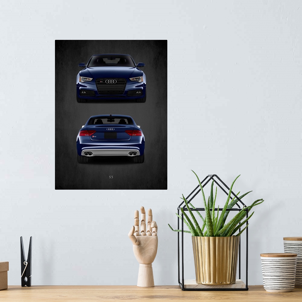 A bohemian room featuring Photograph of the front and back of a blue Audi S5 printed on a black background with a dark vign...