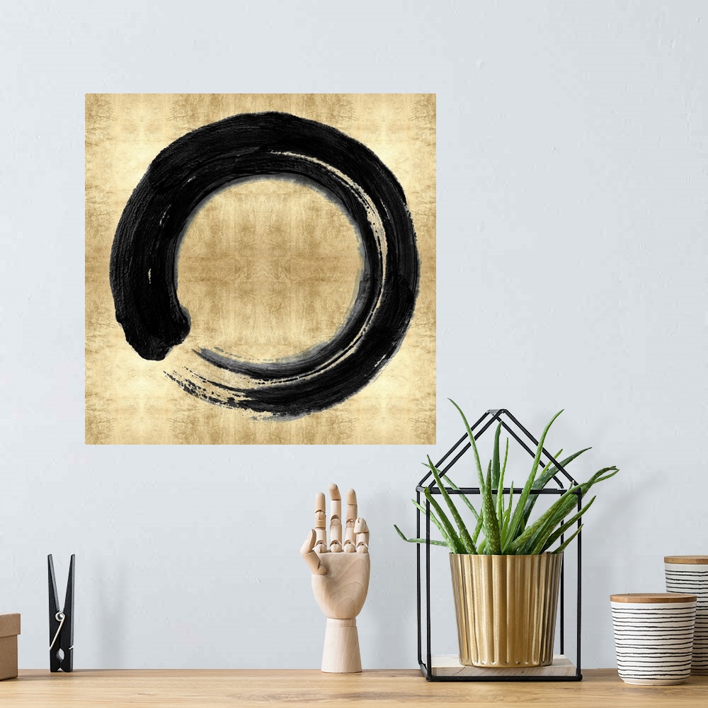 A bohemian room featuring This Zen artwork features a sweeping circular brush stroke in black over a mottled gold color bac...