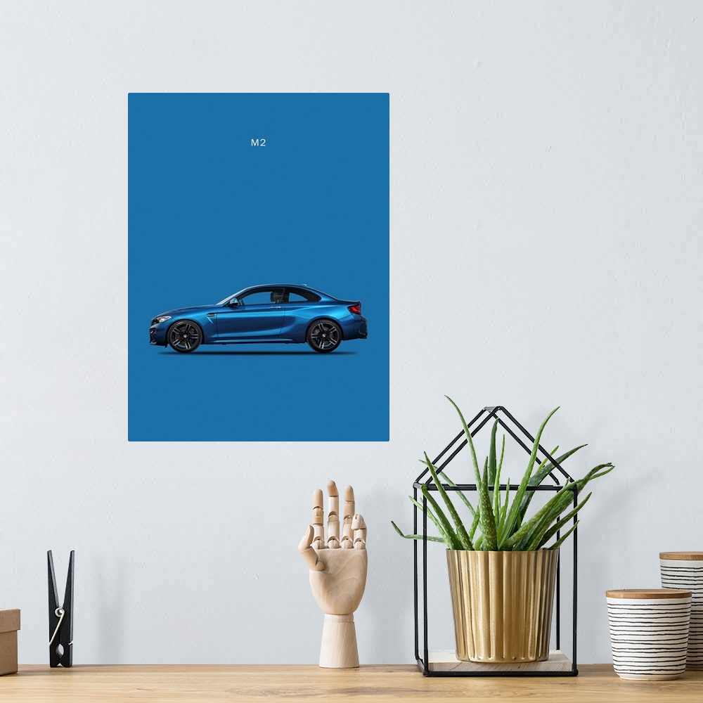 A bohemian room featuring Photograph of a blue BMW M2 printed on a blue background