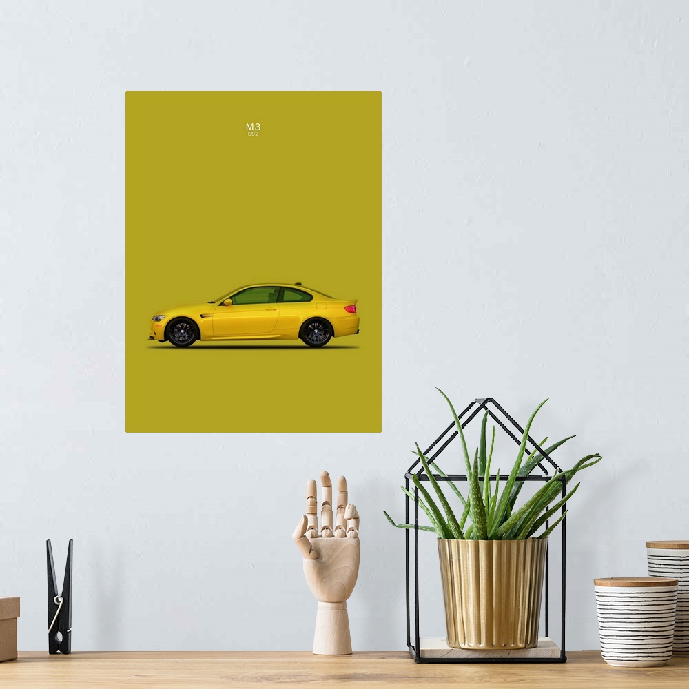 A bohemian room featuring Photograph of a yellow BMW M3 E92 printed on a yellow-green background