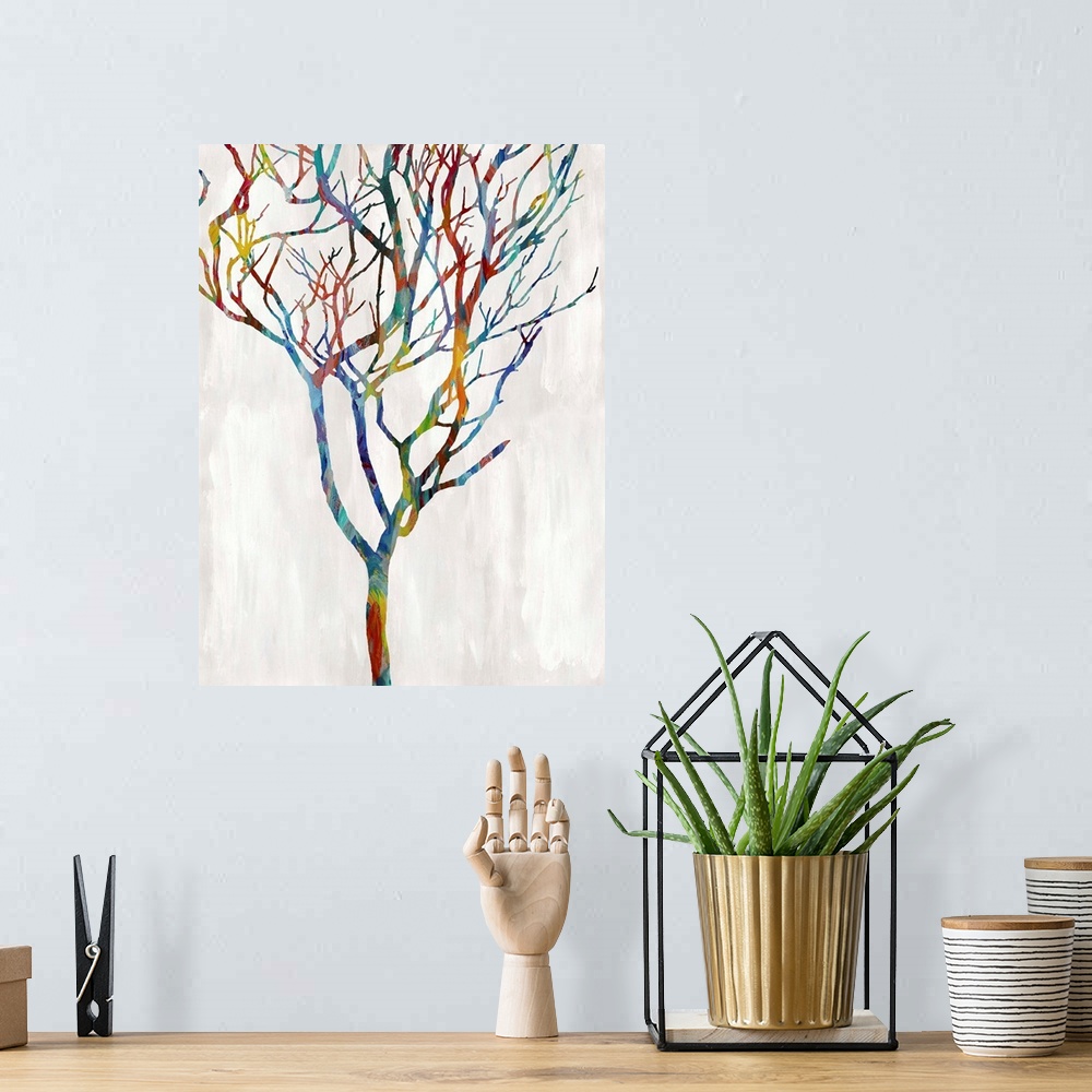 A bohemian room featuring Colorful silhouette of a leafless tree on a white and gray background.