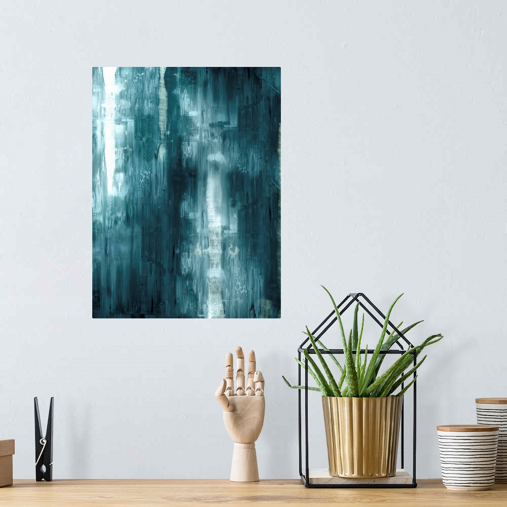 A bohemian room featuring Vertical abstract painting with dark teal hues mixed in with white streaking down the canvas.