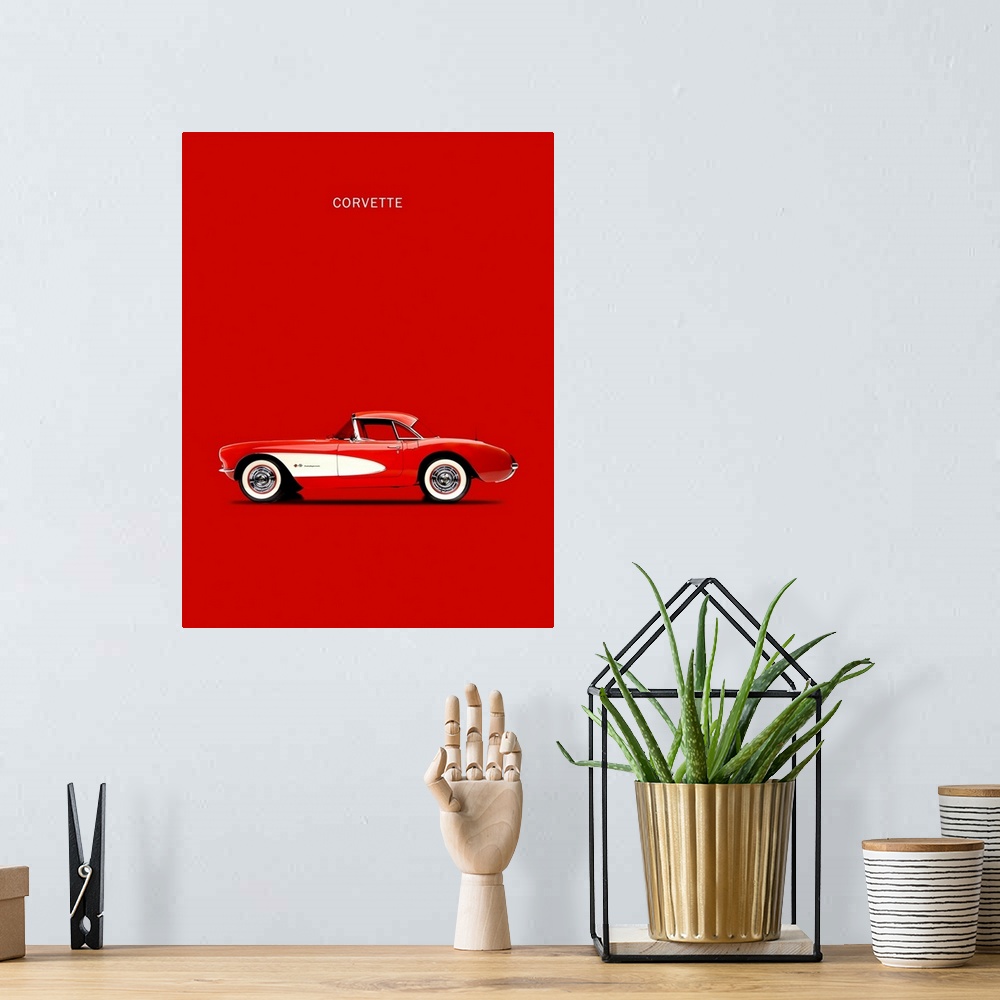 A bohemian room featuring Photograph of a red and white Corvette 1957 printed on a red background