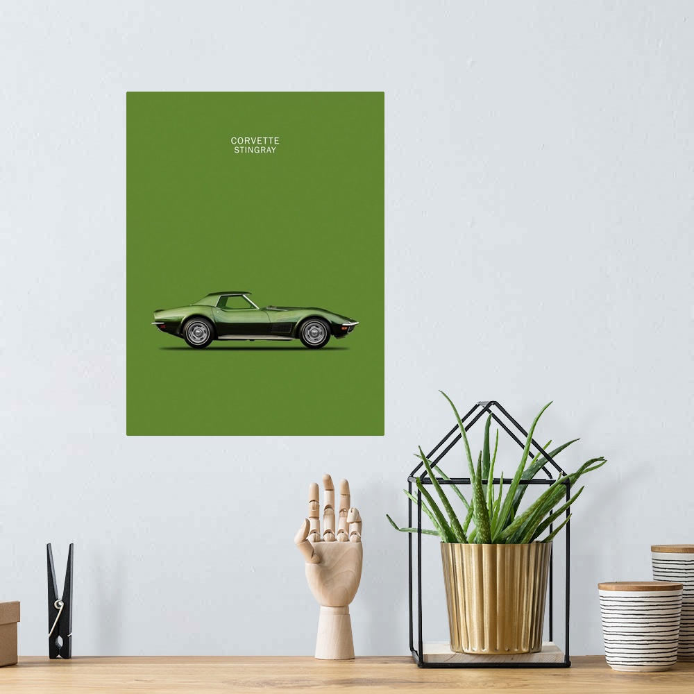 A bohemian room featuring Photograph of a dark green Corvette Stingray 1970 printed on a green background