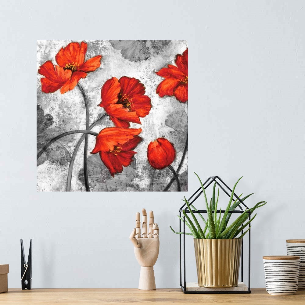 A bohemian room featuring Square decor with five red poppies on a background made with grey tones and a few grey poppies.