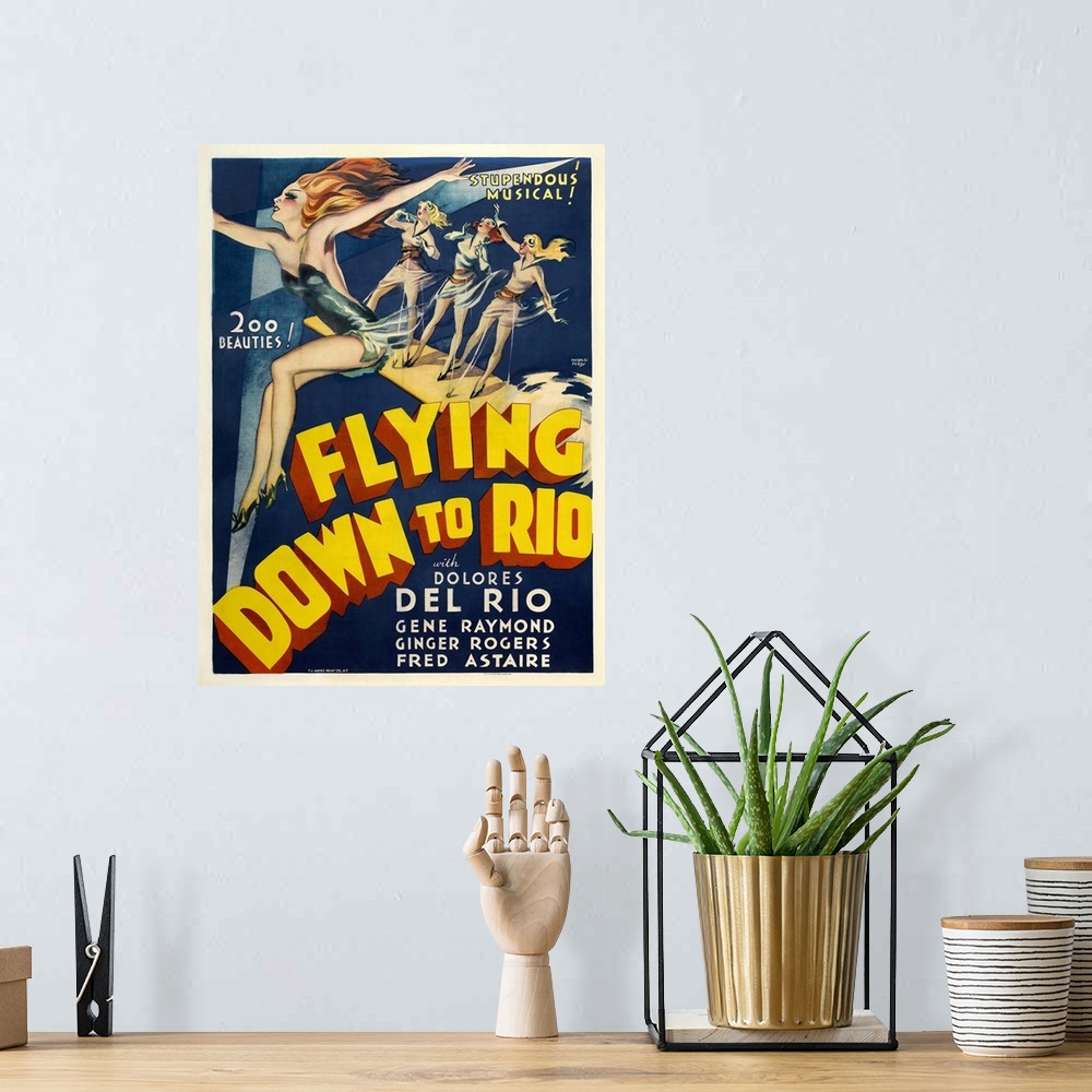 A bohemian room featuring Vintage movie poster for "Flying Down To Rio"