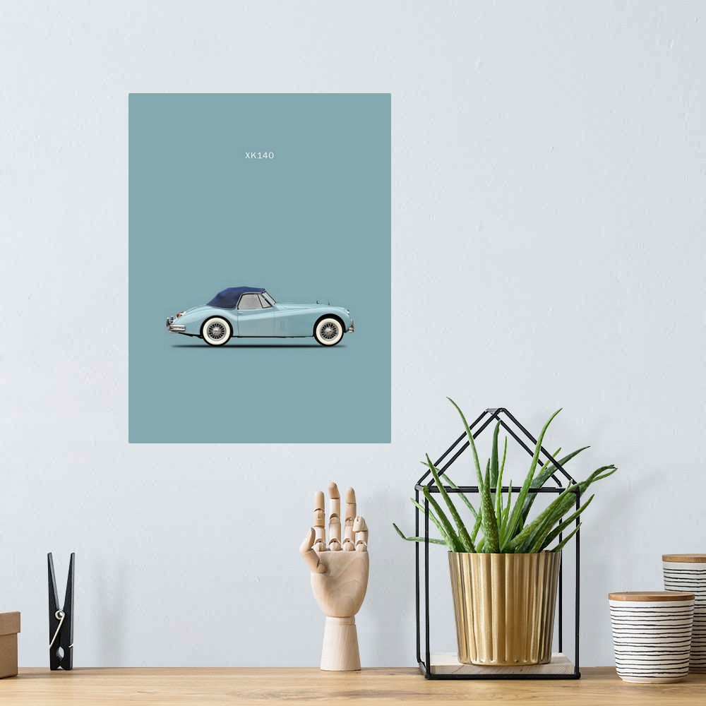 A bohemian room featuring Photograph of a light blue Jaguar XK140 with a dark blue top printed on a light blue background