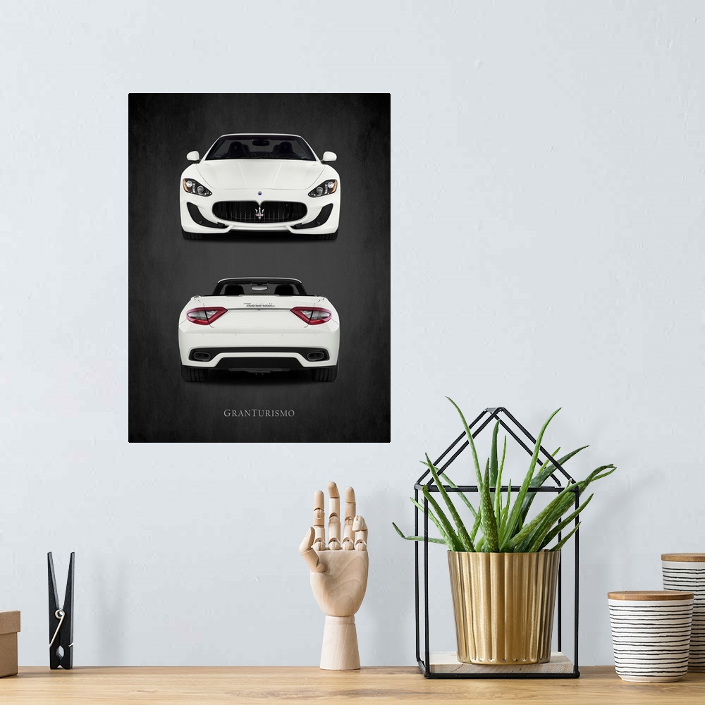 A bohemian room featuring Photograph of the front and back of a white Maserati GranTurismo printed on a black background wi...