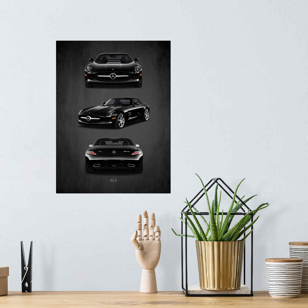 A bohemian room featuring Photograph of the front, back, and side view of a black Merc Benz SLS AMG printed on a black back...
