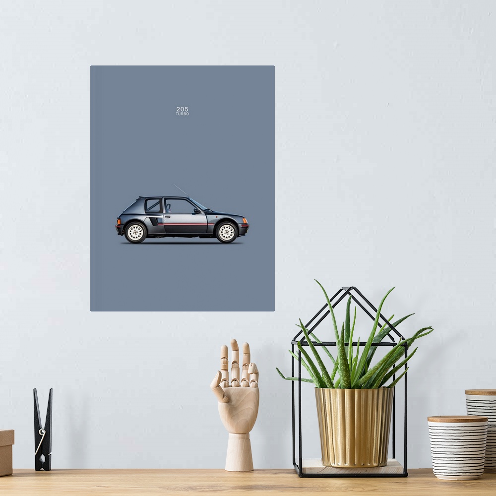 A bohemian room featuring Photograph of a slate blue-gray Peugeot 205 Turbo 1984 printed on a slate blue background