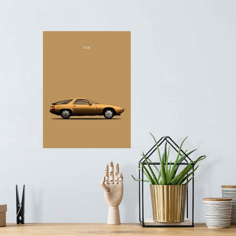 A bohemian room featuring Photograph of a gold Porsche 928 1979 printed on a gold background