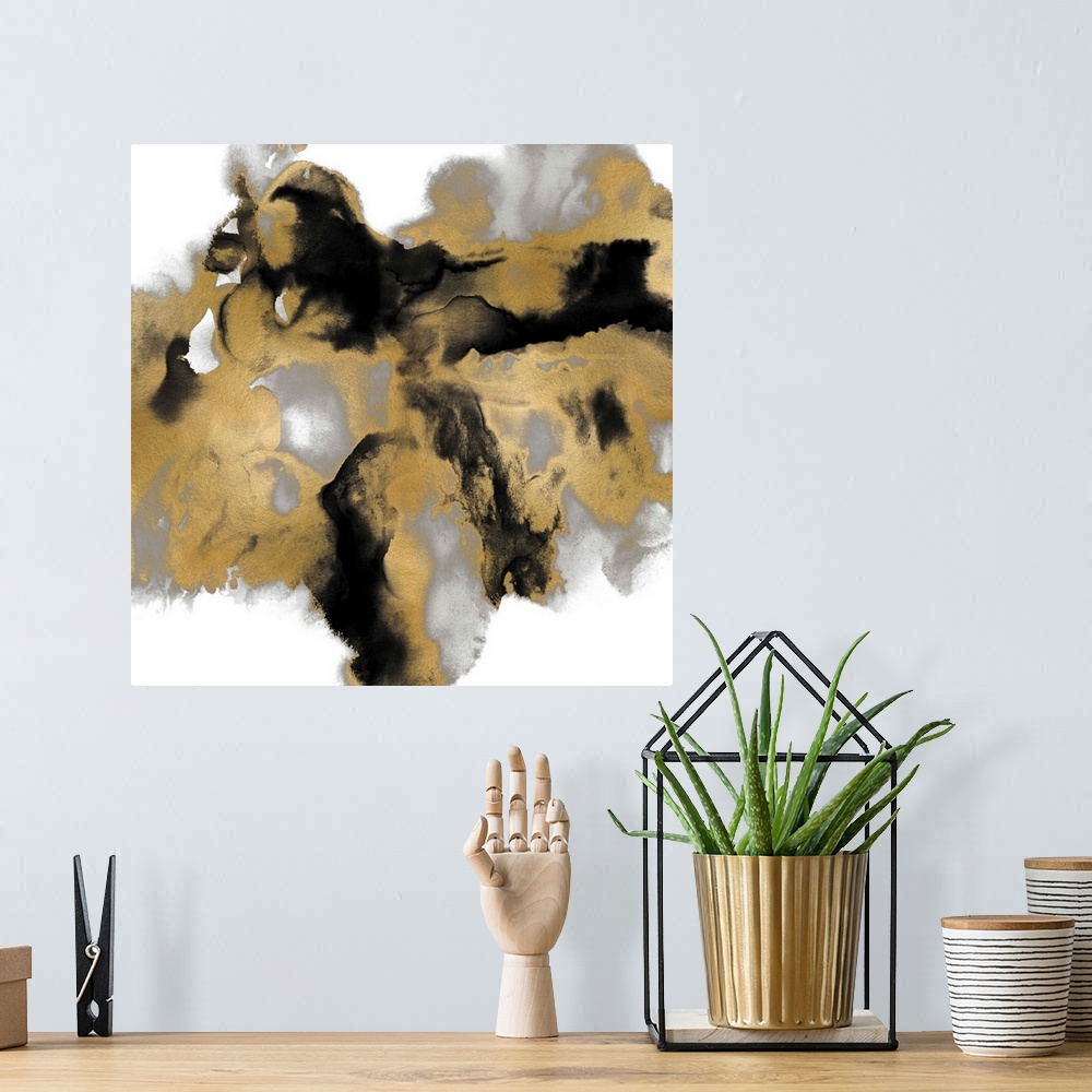 A bohemian room featuring Square abstract art in gold, black, and silver on a white background.