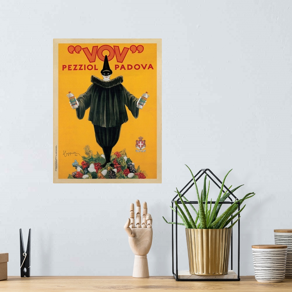 A bohemian room featuring Vintage advertisement of Vov (19220 by Leonetto Cappiello.