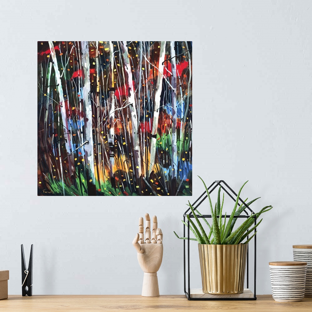 A bohemian room featuring A square abstract painting of a forest of birch trees with black, red, yellow and red colors in t...