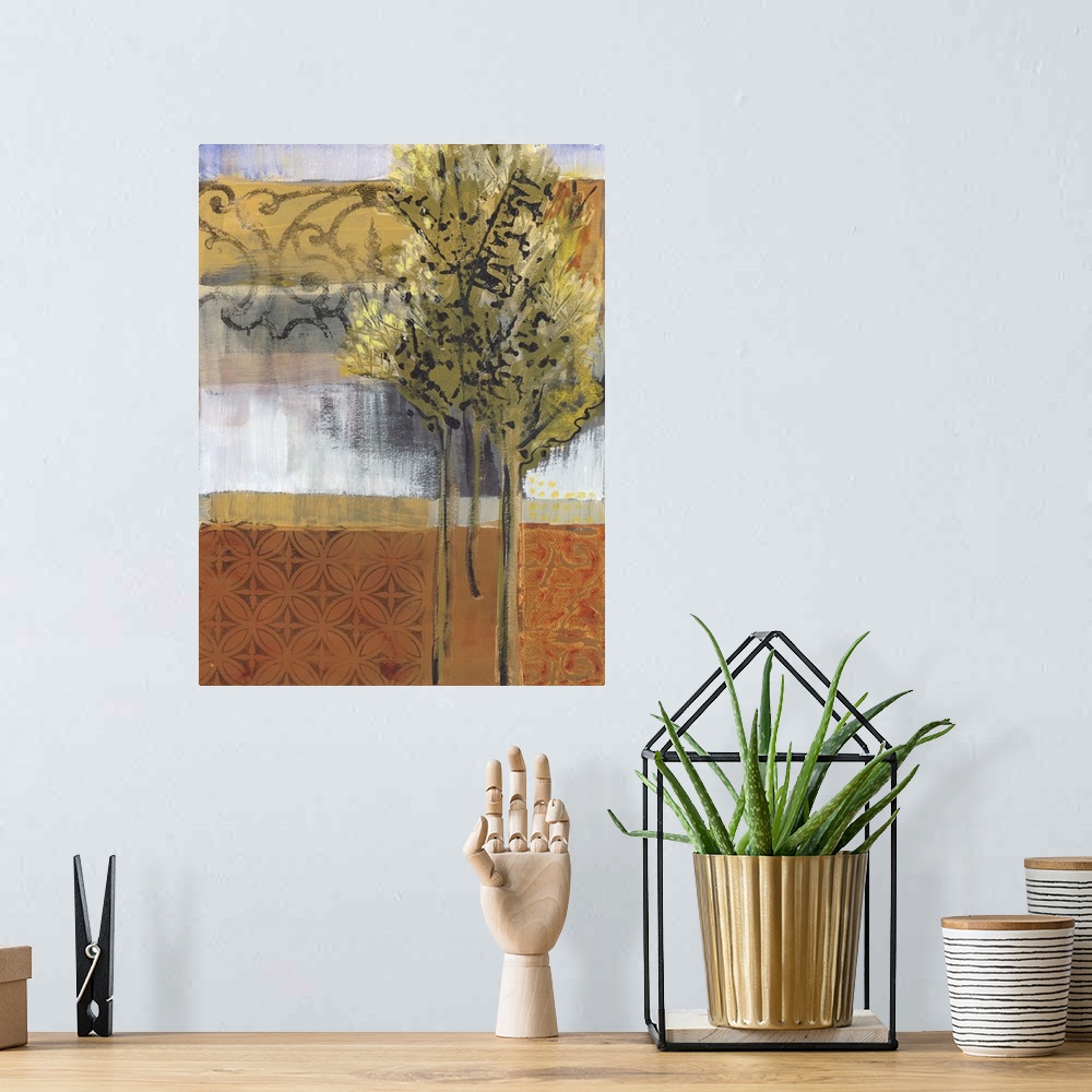 A bohemian room featuring A vertical landscape painting of a few trees along a path next to water with a subtle hint of a g...