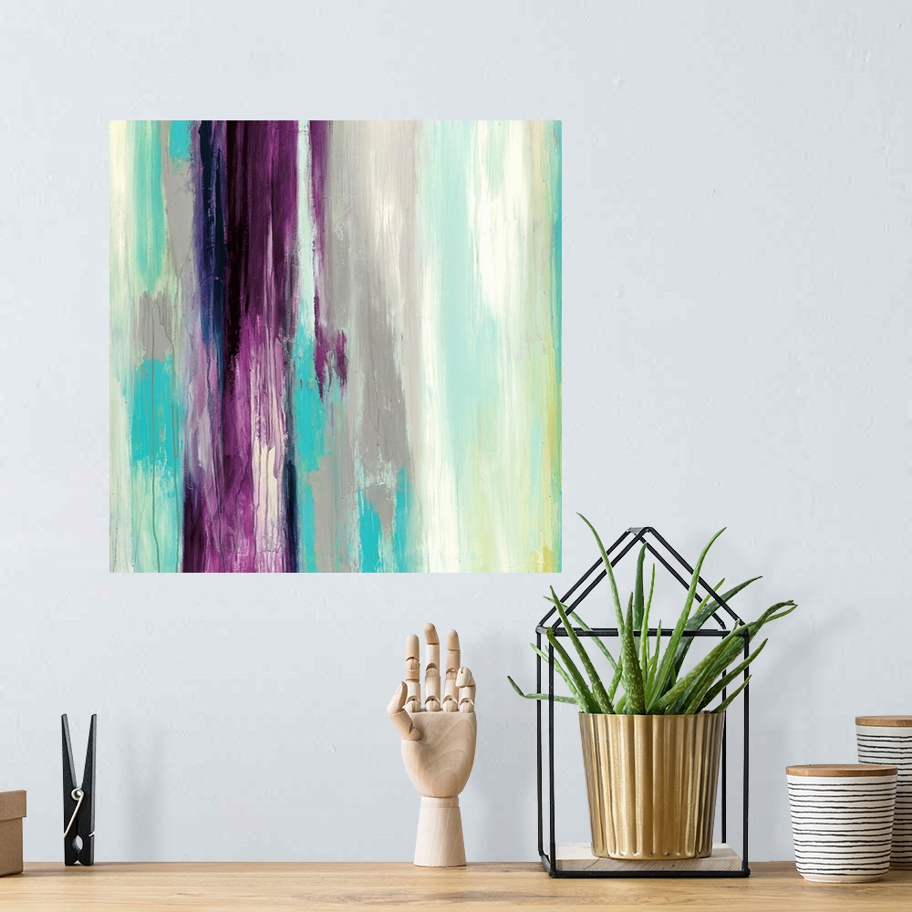 A bohemian room featuring Square abstract of vertical strokes of paint in teal, gray, purple and yellow.