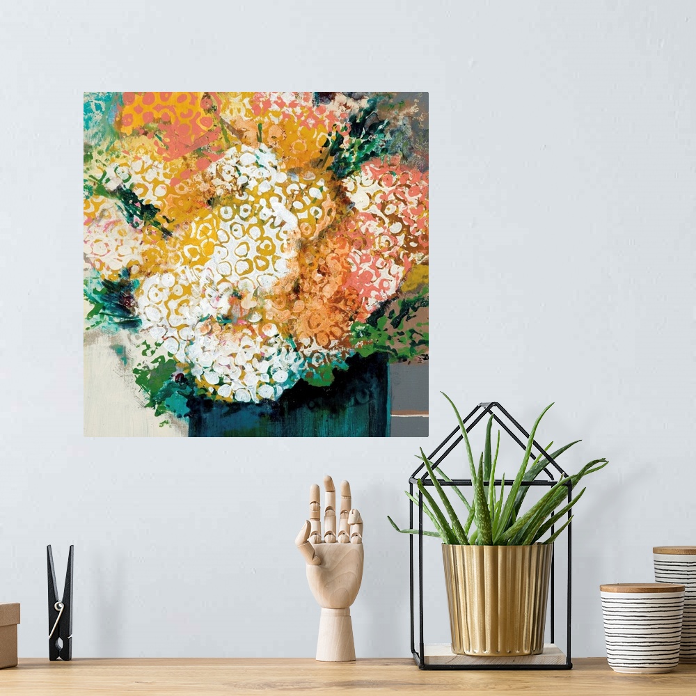 A bohemian room featuring A modern painting of a vase of flowers done in layers of paint with a circular design on the top ...