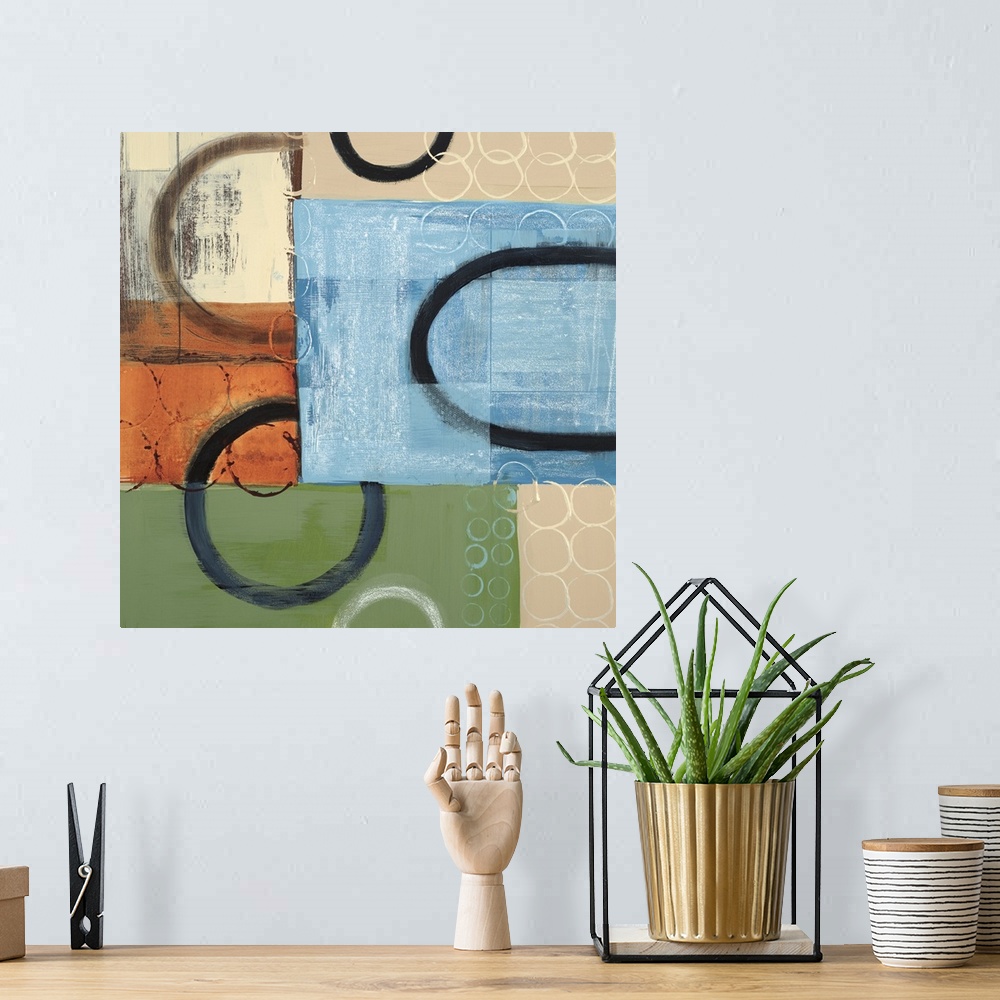 A bohemian room featuring Abstract painting of multi-colored squared shapes with circular elements in black and white overl...