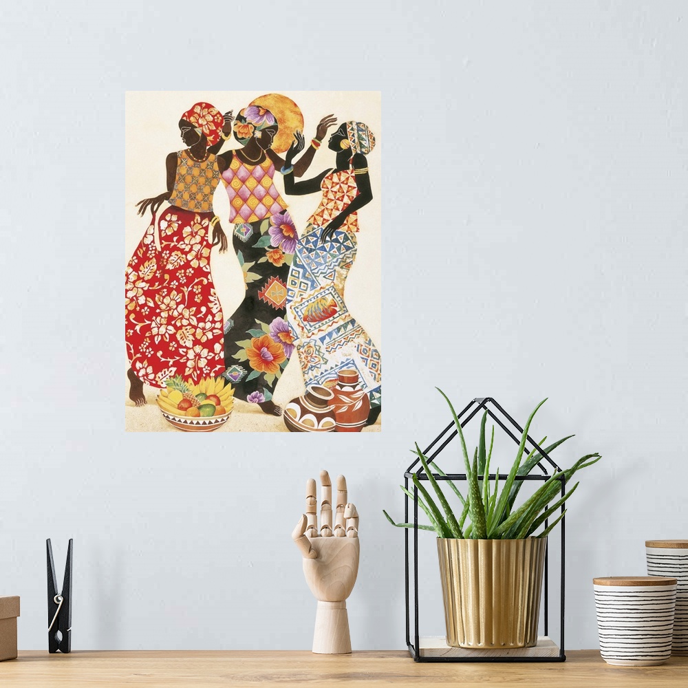 A bohemian room featuring Three African women in beautiful patterned robes celebrating.