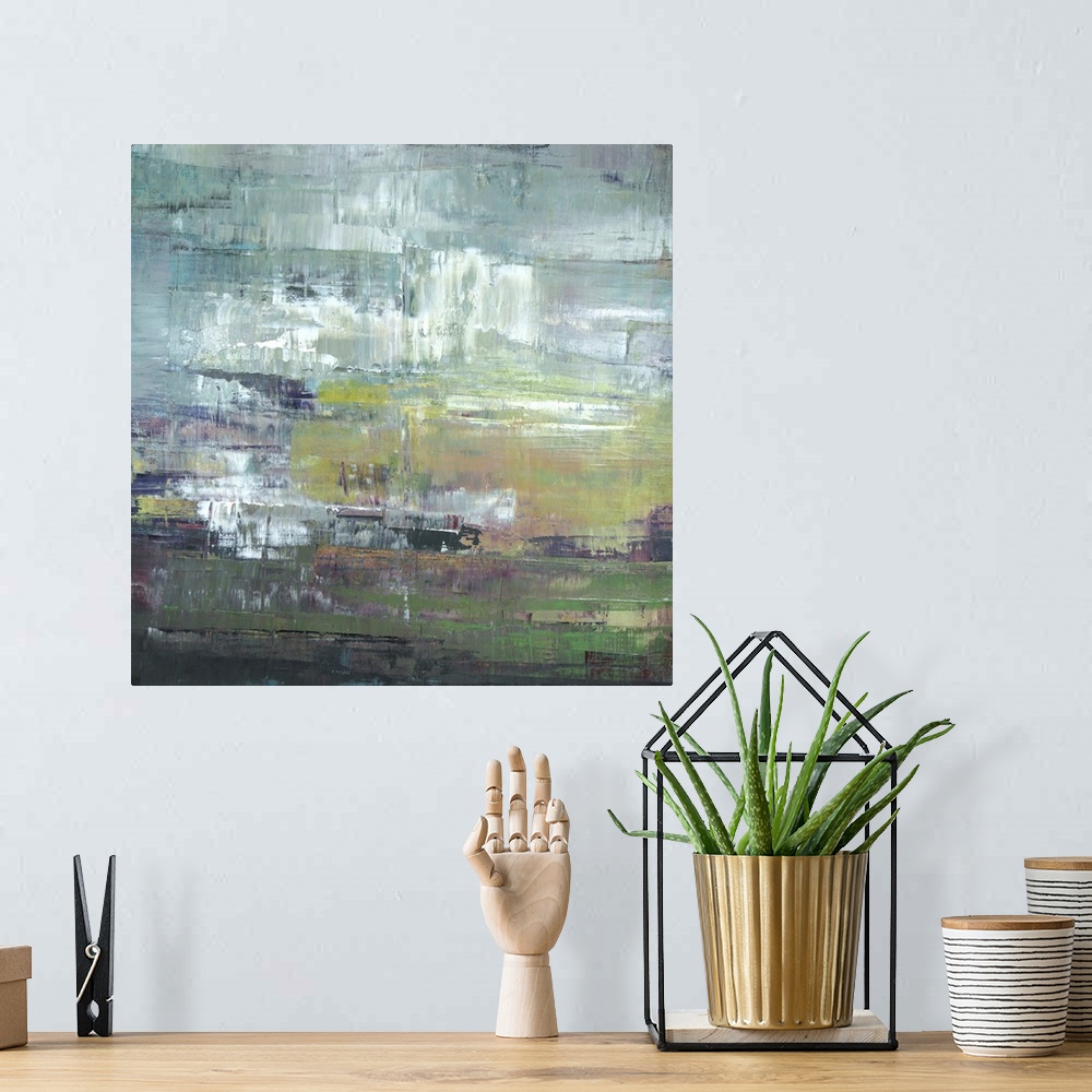 A bohemian room featuring Square abstract painting in shades of green and gray.