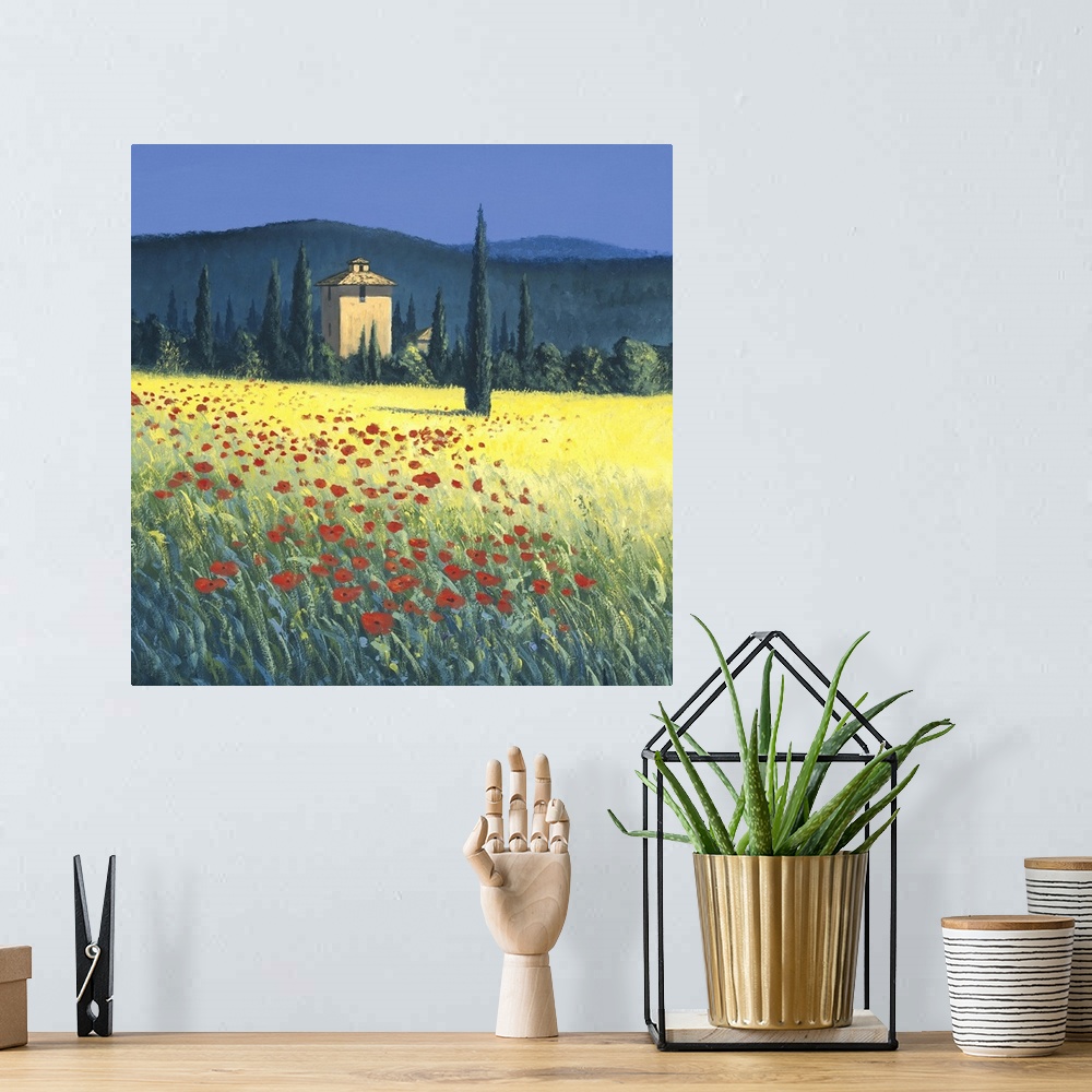 A bohemian room featuring Landscape painting of a Tuscan hillside with tall cypress trees.