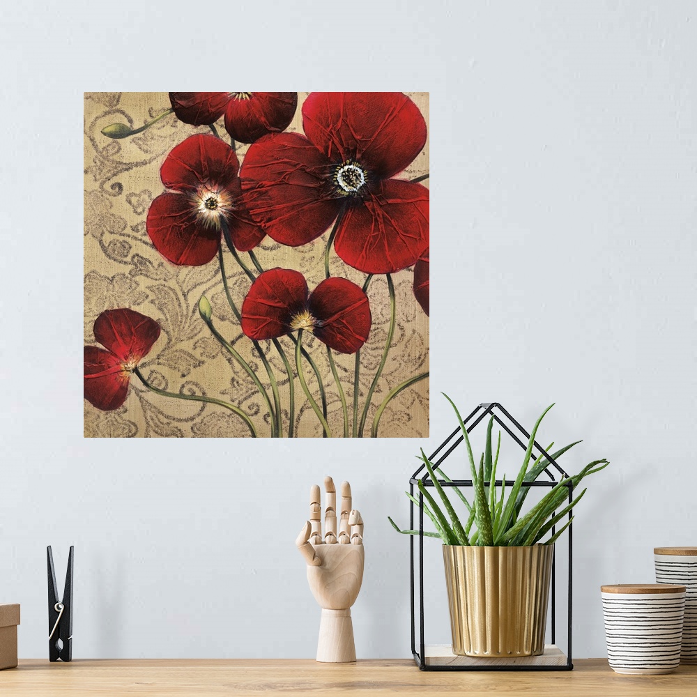 A bohemian room featuring Square painting of a group of red flowers with textured petals against a neutral backdrop with a ...