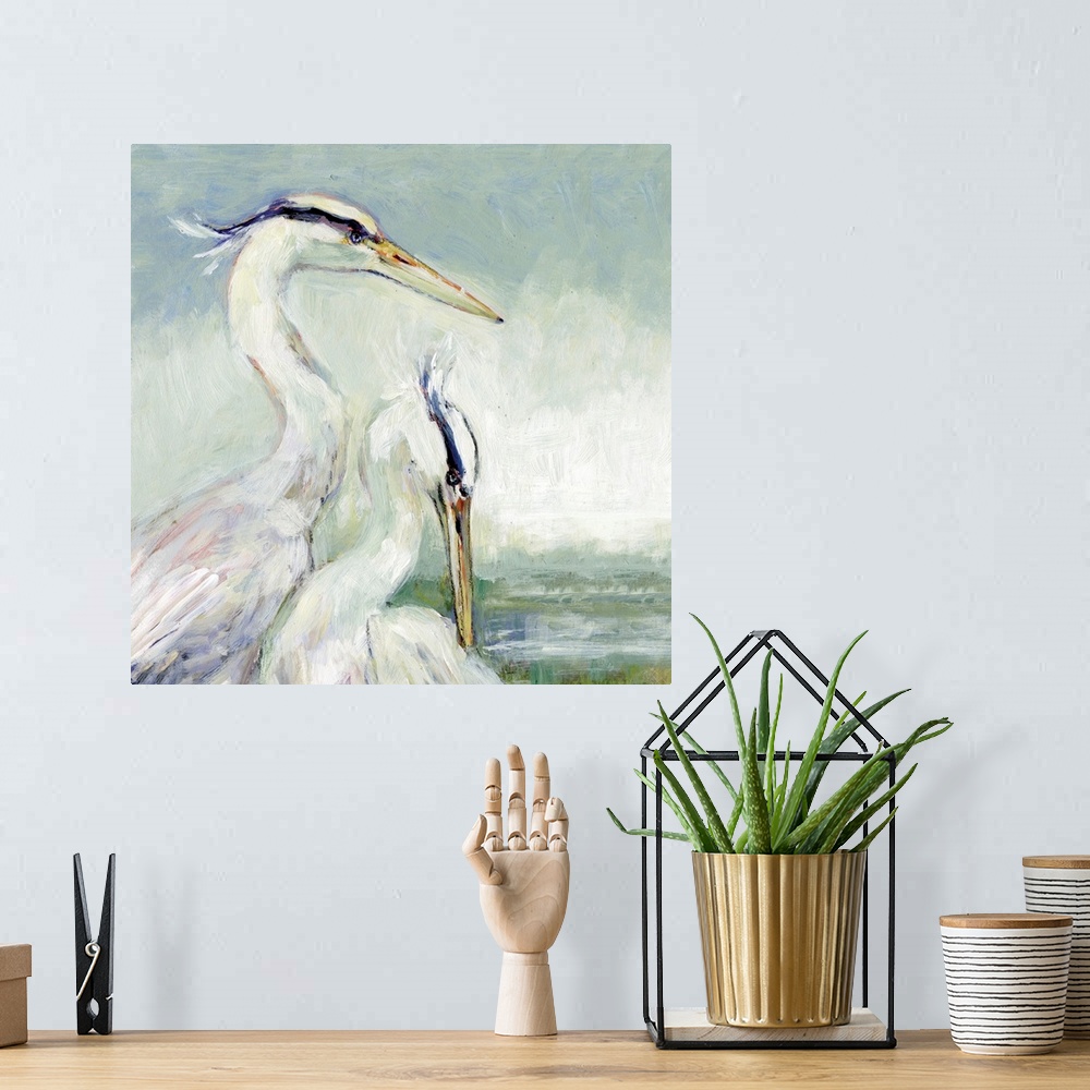 A bohemian room featuring A pair of egrets bring the graceful sea bird into any coastal decor.