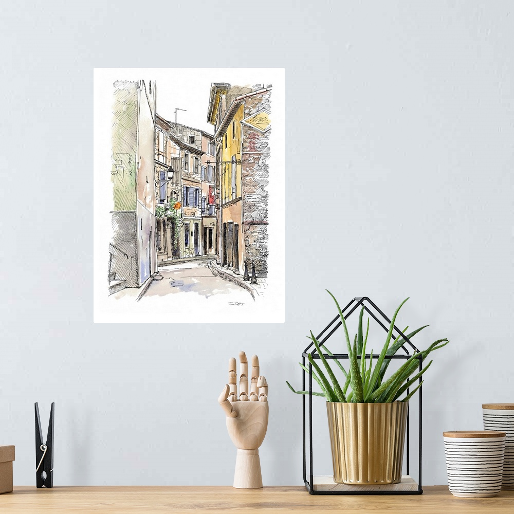 A bohemian room featuring A lovely pen and ink depiction of a European back alleyway.