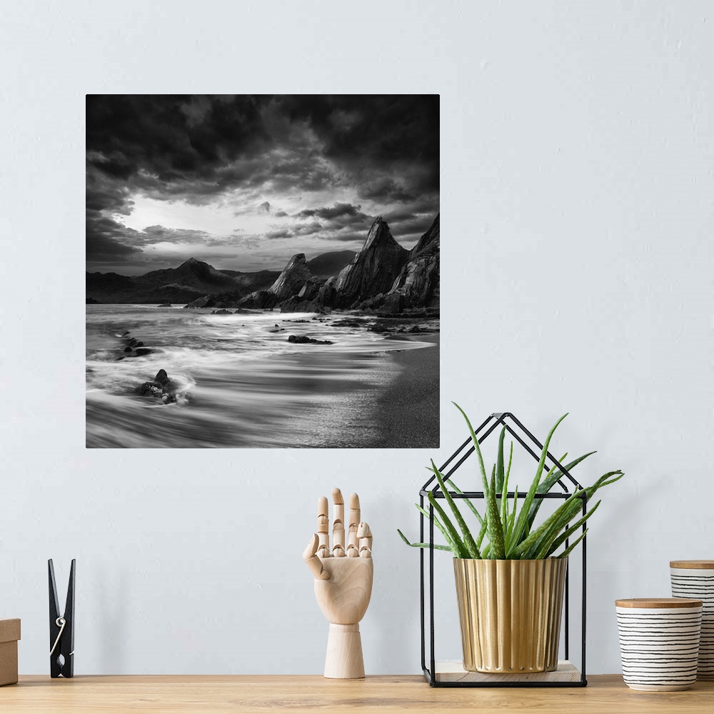 A bohemian room featuring Stunning mountain and sea sunset landscape black and white.
