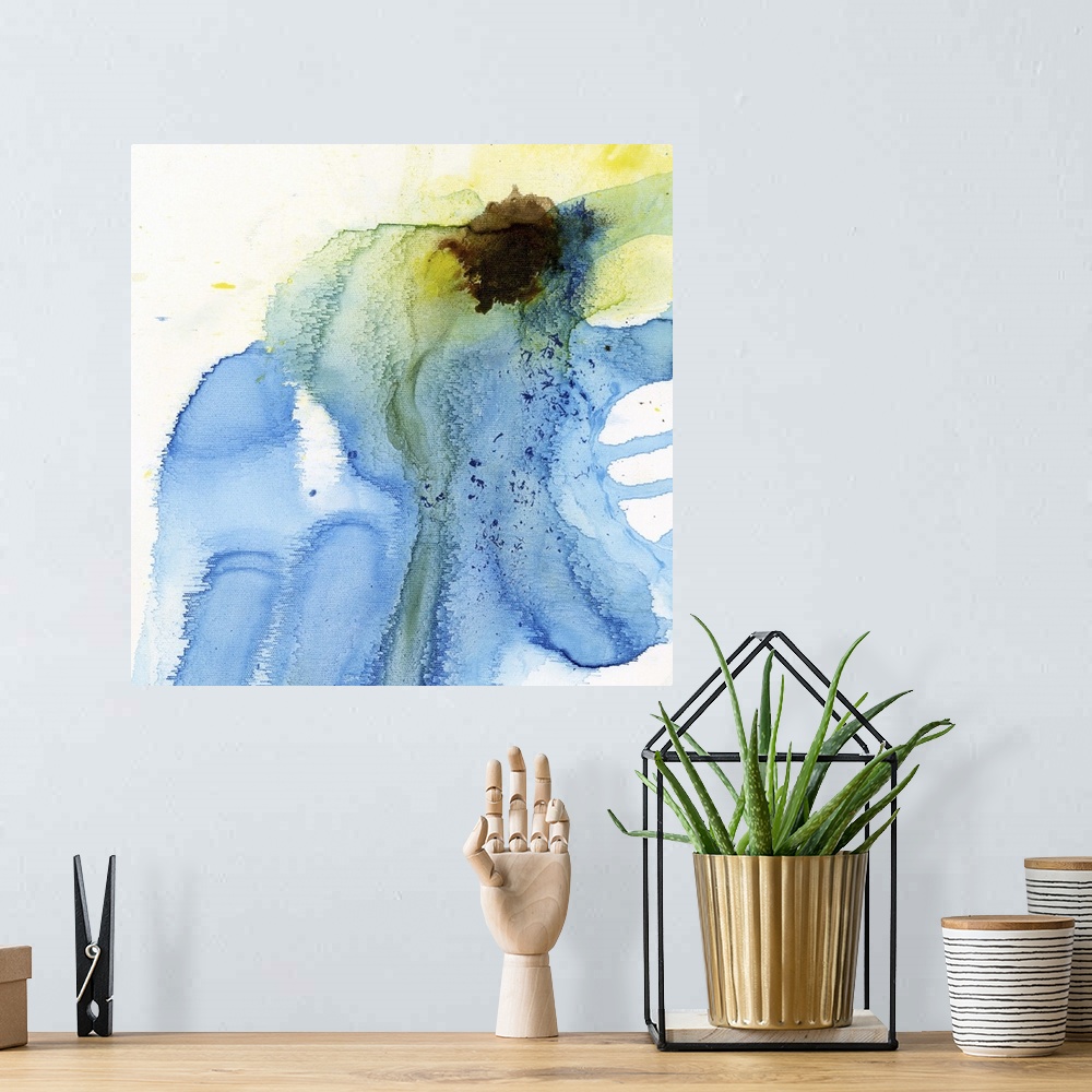 A bohemian room featuring A contemporary abstract watercolor painting using a light blue wash with a splash of bright yello...