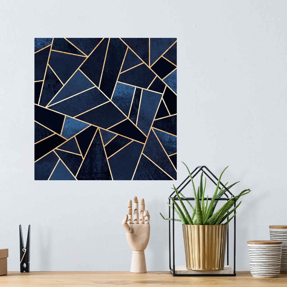 A bohemian room featuring A contemporary, geometric, diagonal art deco design in shades of indigo. The shapes are outlined ...