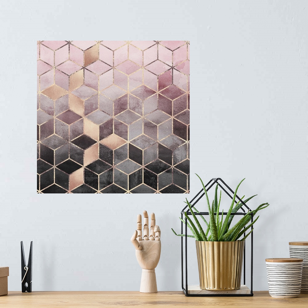 A bohemian room featuring A prism of triangles in various shades of textured rose gold and grey are arranged in to form a t...